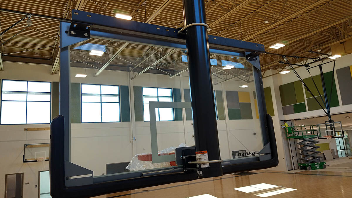 Competition glass basketball backboard with direct mount behind rim